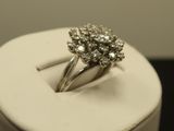 a ring that is sitting on top of a white box