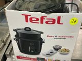 a box that has a pot on top of it
