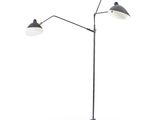 un lampadaire noir et blanc muni de trois lampes, monté sur un trépied