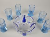 a lot of glasses and a bowl on the table