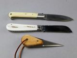 three different types of knives that are on the table