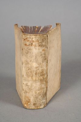 an old book that is sitting on a table