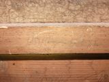 a close up of a piece of wood with a piece of wood sticking out of it