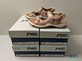 two boxes of shoes are stacked on top of each other on a table