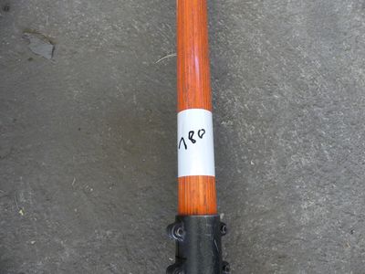 a close up of a baseball bat with a sticker on it