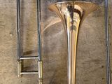 a brass instrument that is sitting on the floor