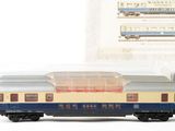 a toy train that is sitting next to a box