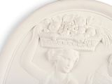 a white plate with a picture of a woman holding a basket of flowers