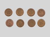 un ensemble de six pièces de monnaie britanniques différentes posées sur un fond blanc