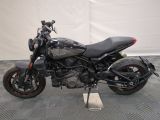 a picture of a motorcycle on display in a showroom