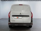 the rear end of a white van parked in a garage