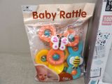 a bag of baby rattles and a package of pacifiers