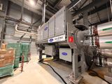 a large machine that is inside of a building