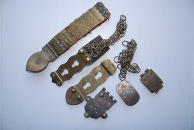 a lot of different metal items that are on a table