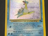a close up of a pokemon card on a table