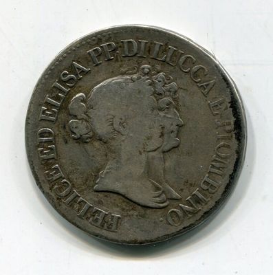 une vieille pièce d'argent portant une tête de femme