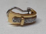 une image représentant une bague en or et en argent sertie de diamants