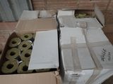 a box full of doughnuts sitting on the floor
