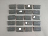 a lot of nintendo game cartridges sitting on a table
