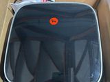 a suitcase that is sitting in a box on the floor
