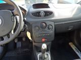 a dashboard of a small car with a steering control