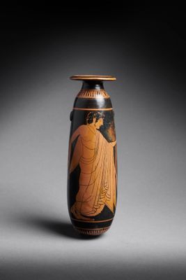 an image of a vase with an image of a woman on it