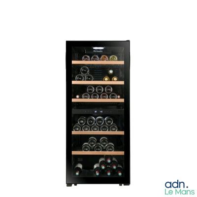 a close up of a wine cooler with many bottles in it