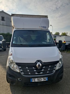 a white van that is parked in a parking lot