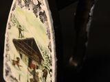 a picture of a decorative plate with a picture on it
