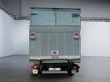 a truck that is parked in a large room