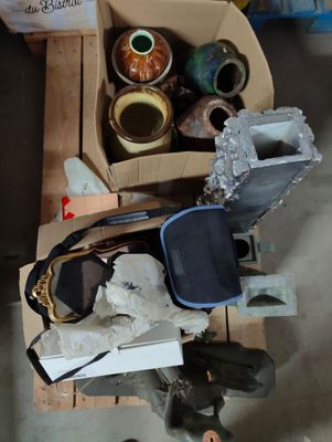 a box of assorted items sitting on a pallet