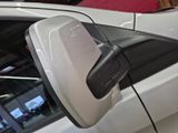 a close up of a car ' s side view mirror