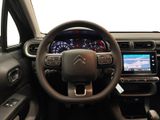 the interior of a car with a steering wheel, dashboard, and dash board
