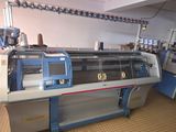 two machines that are sitting in a room