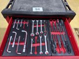 many tools in a tool box on the table