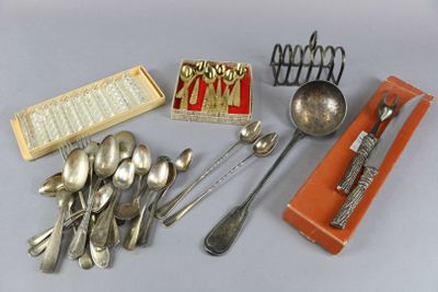 many silver spoons and spoon spoons and a box of silverware