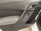 a close up of a car door handle with the door handle open