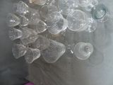 a lot of empty wine glasses on a table