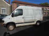 a white van parked on the side of the road