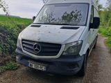 a van that is parked on the side of the road