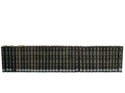 a row of old books sitting on top of each other