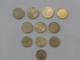 a lot of coins that are on the table