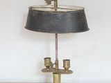 a lamp that is sitting on a table in a room