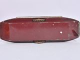 a red case that is sitting on a white surface
