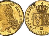 a gold sovereign coin with a crown on top of it
