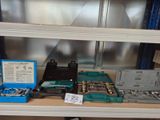 many different tools on a shelf in a room