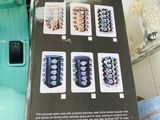 a box with a bunch of buttons in it