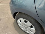 a close up of a car tire with a sticker on it