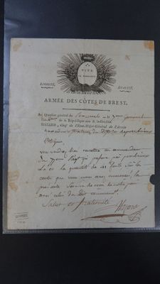 an old document with a picture of a sun on it