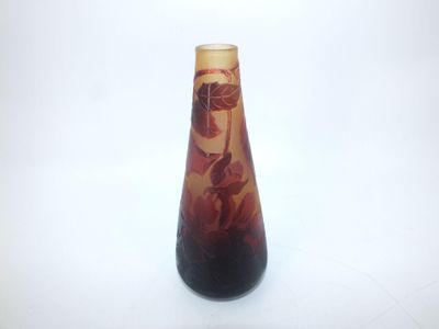 a vase that is sitting on a white surface